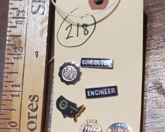 Old tranportation pins including train engineer and conductor. 