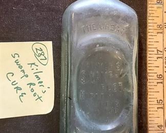 Dr Kilmers Swamp Root Kidney Liver and Bladder Cure medicine bottle.  The FDA made them stop putting "cure" and "remedy" on the bottles about 1910.  Lots of old cure and remedy bottles in this sale. 
