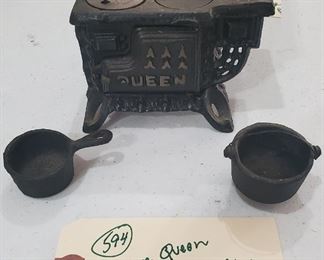 Queen cast iron toy stove