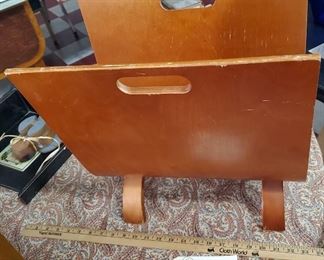 Mid century Eames / Dansk era bentwood magazine rack.  nice piece if you like MCM. 
