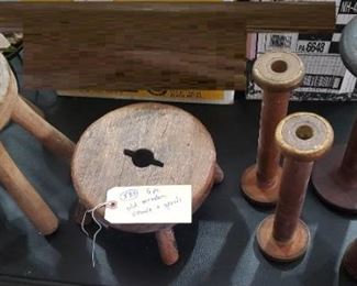 antique wooden stools and spools