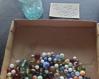 antique aqua fruit far full of old marbles