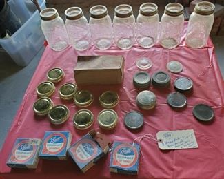 old 1976 bi centennial fruit jars and lots of lids, jar rubbers still in the boxes. 