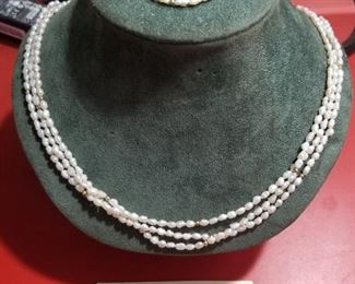 freshwater pearl necklace and bracelet with 14k gold clasp / beads. 