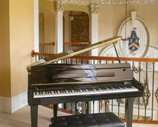 Same as previous item. Bachman baby grand piano and chair