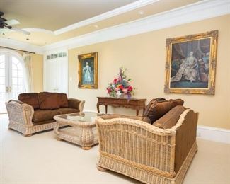 Same as previous photo. Vintage curved woven wicker custom upholstered sofas and coffee table 