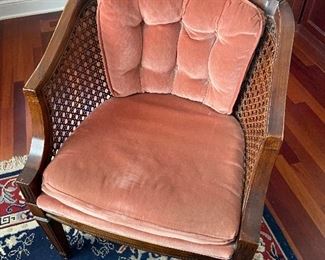 Peach velvet upholstered cane chair 