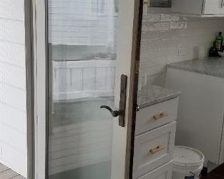 Andersen hurricane rated full light entry door  with screen door