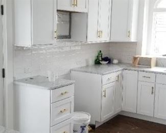 Gorgeous white kitchen with gold trim - all wood construction 