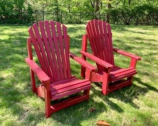 pair of wooden adirondack chairs