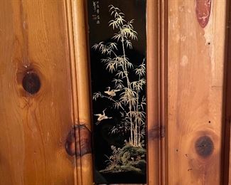 Pair of lacquered wall hangings 