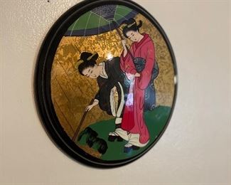 Vintage domed lacquered Japanese wall hangings 