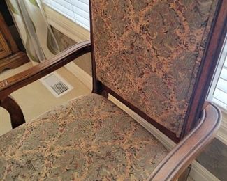 Very ornate and Beautiful dining set purchased at Nebraska Furniture Mart 6 chairs and 2 Captains chairs