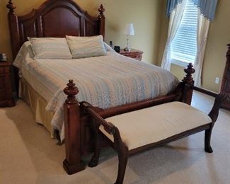 A solid wood bedroom set. Queen bed and bench as well as a high-boy dresser and long dresser with nightstands. Bed head board 67 1/2" H x 66 1/2" W; base board 37" H x 66 1/2" W.  Night stands 28" W x 16" D x 28" H