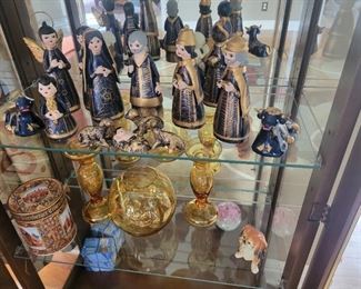 West German Nutcracker, German Hand Carved wood smoking man, Gingerbread cookie tin, German canister, Hungarian mini painting, Elwood hand-blown glass and Egyptian perfume bottle Mexican hand crafted nativity