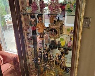 West German Nutcracker, German Hand Carved wood smoking man, Gingerbread cookie tin, German canister, Hungarian mini painting, Elwood hand-blown glass and Egyptian perfume bottle