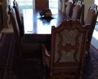Very ornate and Beautiful dining set purchased at Nebraska Furniture Mart 6 chairs and 2 Captains chairs