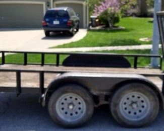 The 16-foot utility trailer has a 10-inch hole in the ramp and the wheel is broken on the  trailer jack  and the tailgate is slightly bent.