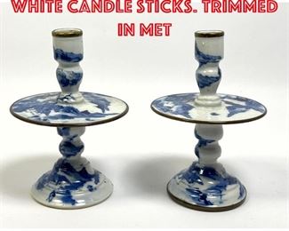 Lot 87 Pr Kang Xi Blue and white candle sticks. Trimmed in met