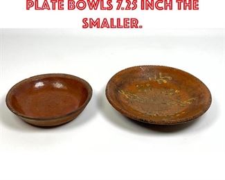 Lot 122 2pc American redware plate bowls 7.25 inch the smaller.