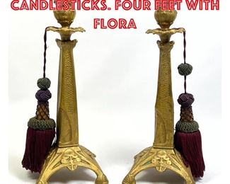 Lot 164 Pr Art Nouveau Metal Candlesticks. Four feet with flora
