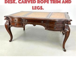 Lot 228 Leather Top Mahogany Desk. Carved Rope Trim and Legs. 