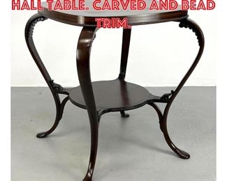 Lot 310 Dark Mahogany Center Hall Table. Carved and Bead Trim. 