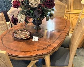 French Provincial dining table, chairs, and china cabinet