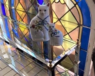 Three curved top stain glass windows