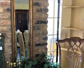 One of two long narrow mirrors