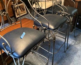 4 bar stools (3 have black seats)