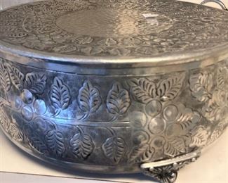 Round embossed metal cake plateau  .  .  . pedestal display plate