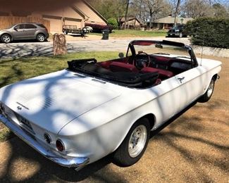 1963 white Corvair convertible with red interior