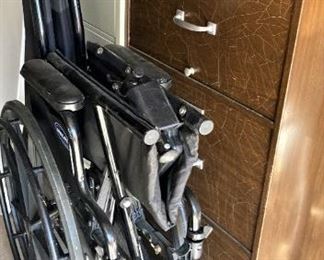 Collapsible wheelchair; file cabinets