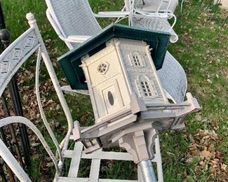 Bird house on tall yard aluminum pole