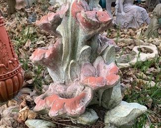 Concrete floral statue