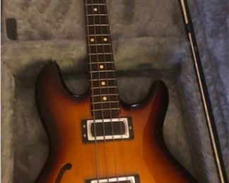 Lakland Sky Bass in original hard shell case.              Micheal Tobias design