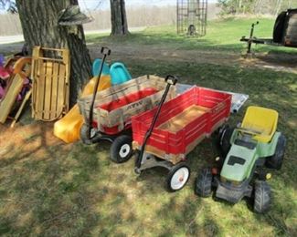 Lots of toys and wagons for the kids (or garden)