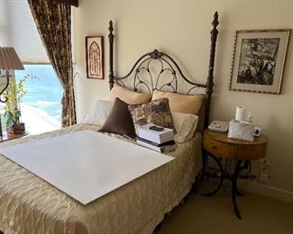 table with drawer and full size iron bed