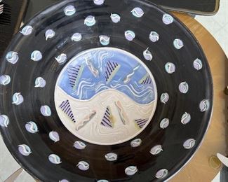 Artist signed on back plate