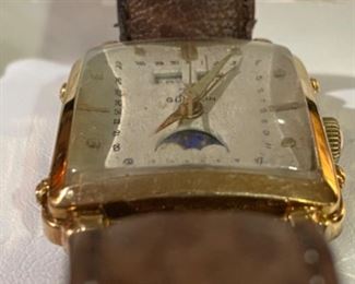 Bid on this beautiful timepiece! Reserve of $7K. This watch was appraised on Antiques Roadshow! Gübelin vintage 18K Triple Date Moonphase mens watch.  New leather band made in France. Selling for client who has had watch serviced and authenticated.  