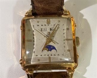 Bid on this beautiful timepiece! Reserve of $7K. This watch was appraised on Antiques Roadshow! Gübelin vintage 18K Triple Date Moonphase mens watch.  New leather band made in France. Selling for client who has had watch serviced and authenticated. 