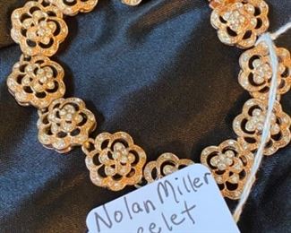 Nolan Miller “flower” bracelet in gold tone, $14. See other pics for same bracelet in silver tone (rhodium plated). 
