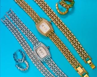 Nolan Miller gold and silver tone watch, bracelet, and earring sets $36/set