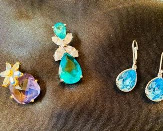 L to R: Norman Miller faceted pendant, $28, Norman Miller pear-shaped pendant, $30, Sterling & blue gemstone pear-shaped earrings, $24