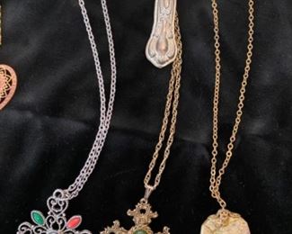 Avon multi-stone cross, $10, Gold cross w/ green stone $12, Agate stone necklace $24, Gorham sterling cross ornament $36