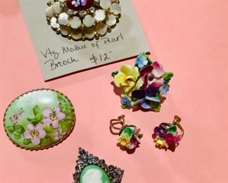 All brooches this page are $12. The Crown Staffordshire porcelain flower with earrings is $12 for the set. 