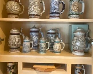 Avon collector steins and some German steins