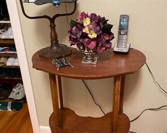 Antique side table and tiffany-style bankers lamp