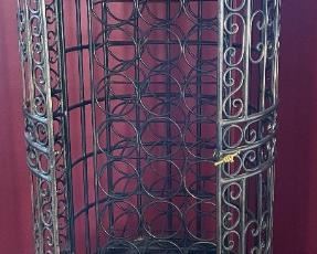 A French wrought iron and copper wine rack approx. 70" tall by Maitland Smith